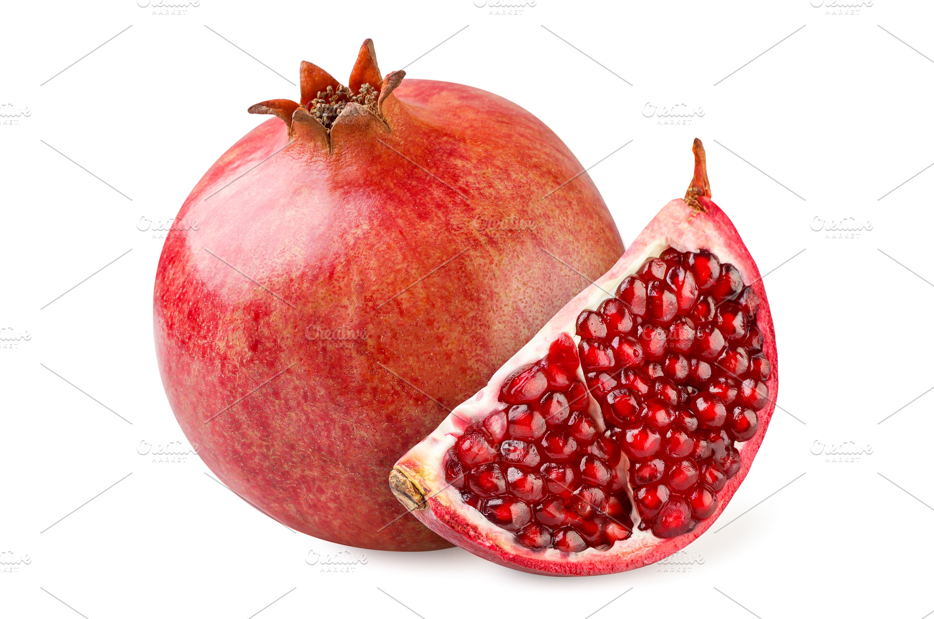 Ripe pomegranate fruit and slice, a Food & Drink Photo by innakreativ