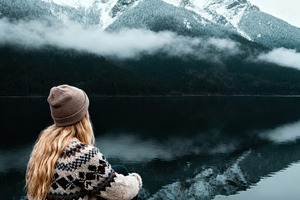 Woman Admiring Snow-Capped Mountains, a Person Photo by Virgo Studio