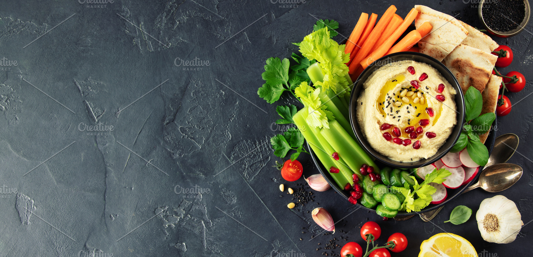 Fresh Hummus Platter with Vegetables and Pita on Dark Background, a Food & Drink Photo by Natalia Klenova's Shop