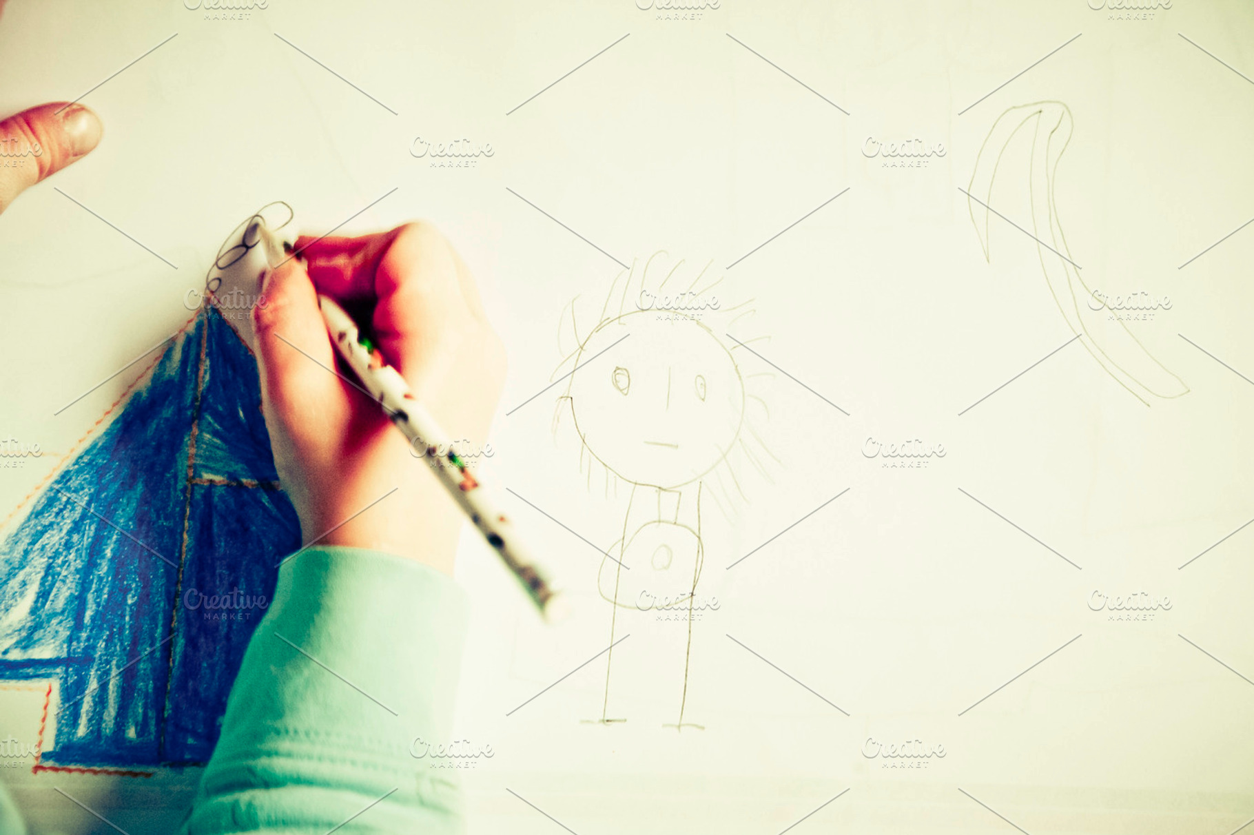 Child drawing stock picture