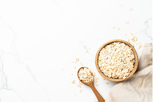 Rolled oats or oat flakes in a, a Food & Drink Photo by Nadia-nb