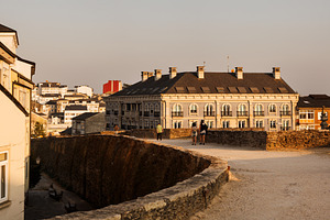 People Walking on Roman Walls Walkway, Lugo, Spain