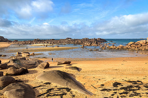 Sandy bay with granite reefs and tidal pools in Tregastel, Franc, a Nature Photo by GoodGoods