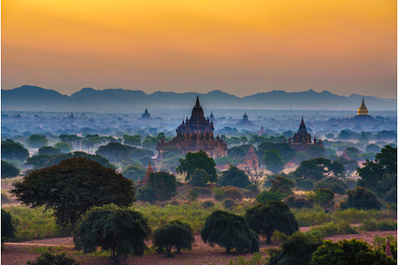 Sunrise over the ancient temples of, an Architecture Photo by Nick Fox