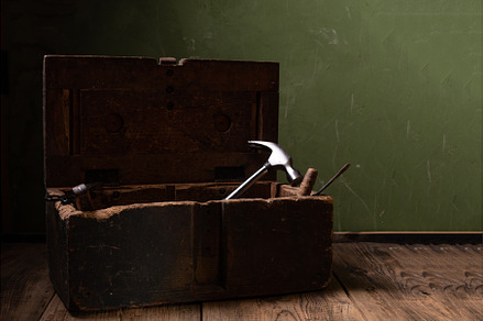 Wooden box with tools on the table, an Industrial Photo by Stockphoto by vzwer