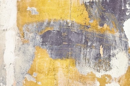 Abstract wall background featuring texture, crack, and yellow