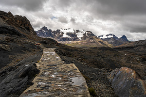 Stone trail leading to Pastoruri Glacier, Huaraz, Peru, amidst r, a Nature Photo by GoodGoods