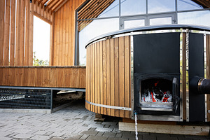 Wooden outdoor hot tub with stove in modern backyard setting, a Photo by AS photostudio