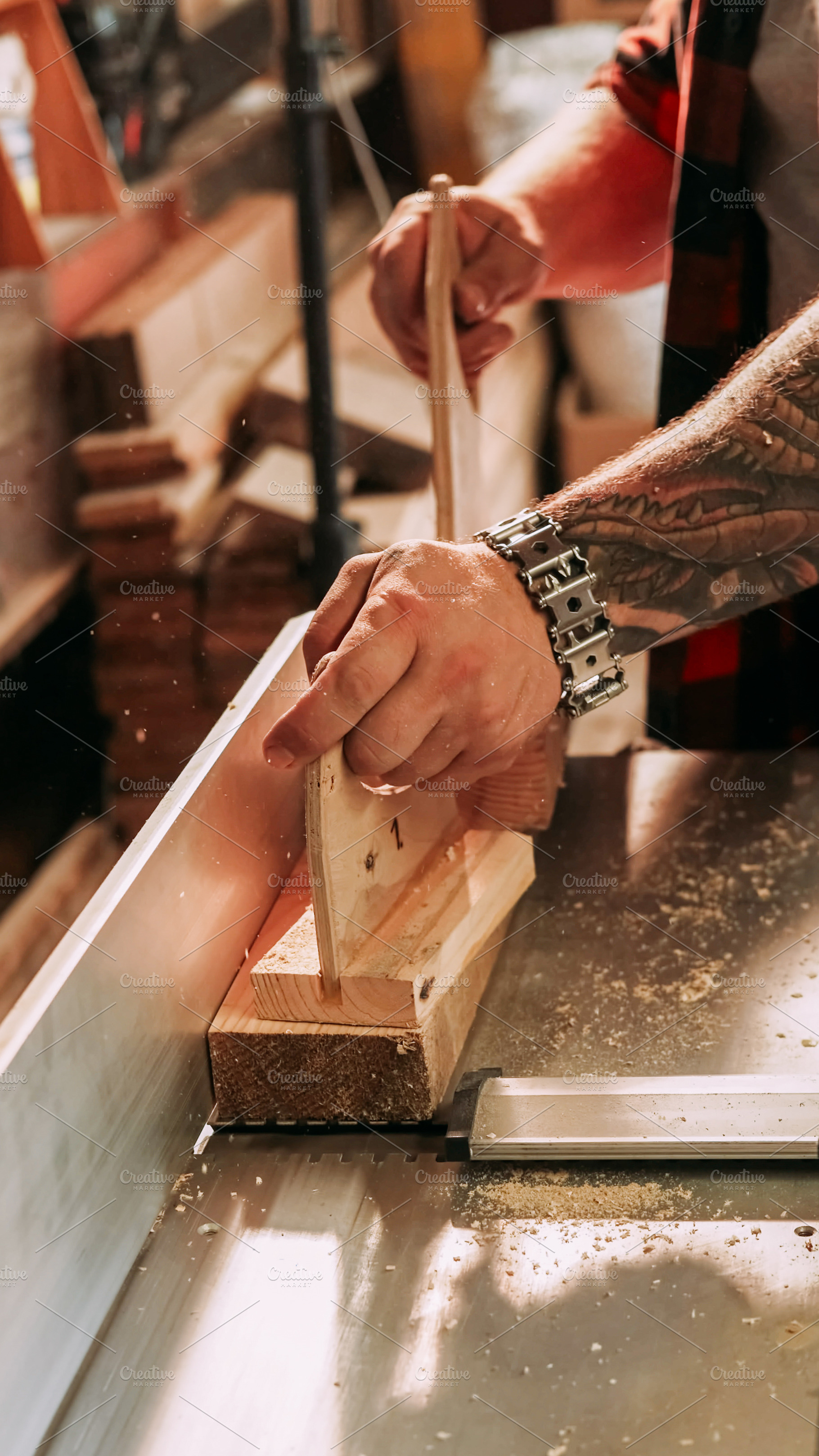 Woodworking process jointer planer carpenter hand, a Person Photo by Photo Drive Studio