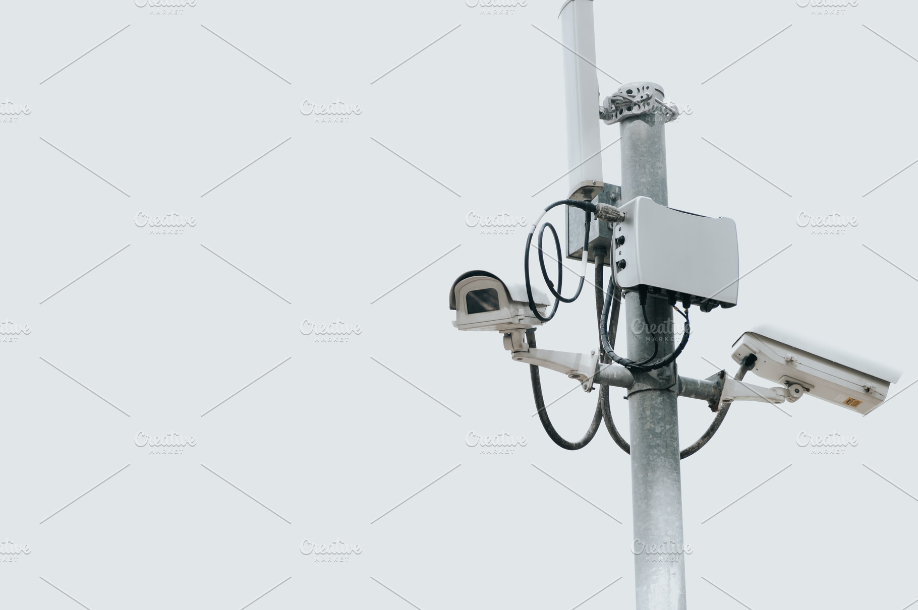 CCTV camera electric pole on isolated white sky with copy space., a Technology Photo by Ministocker