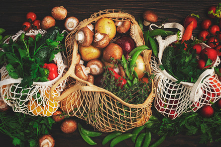 Reusable shopping textile bags full of organic spring vegetables, a Food & Drink Photo by 5PH