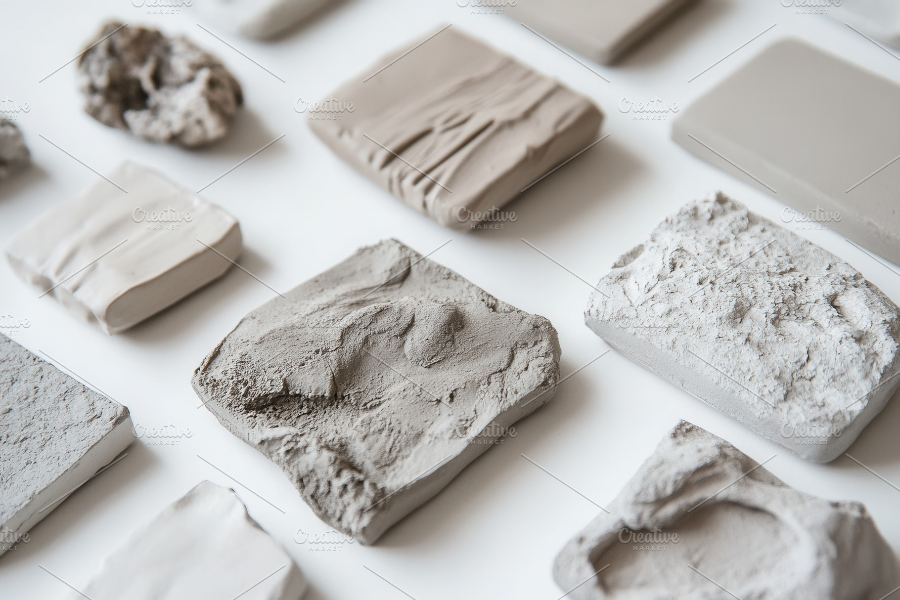 Gray clay textures on white, a Photo by Pavel_design