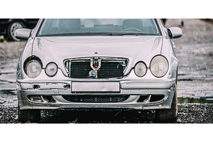 Gray Color Luxury Car With Damages, a Transportation Photo by Our Amazing World
