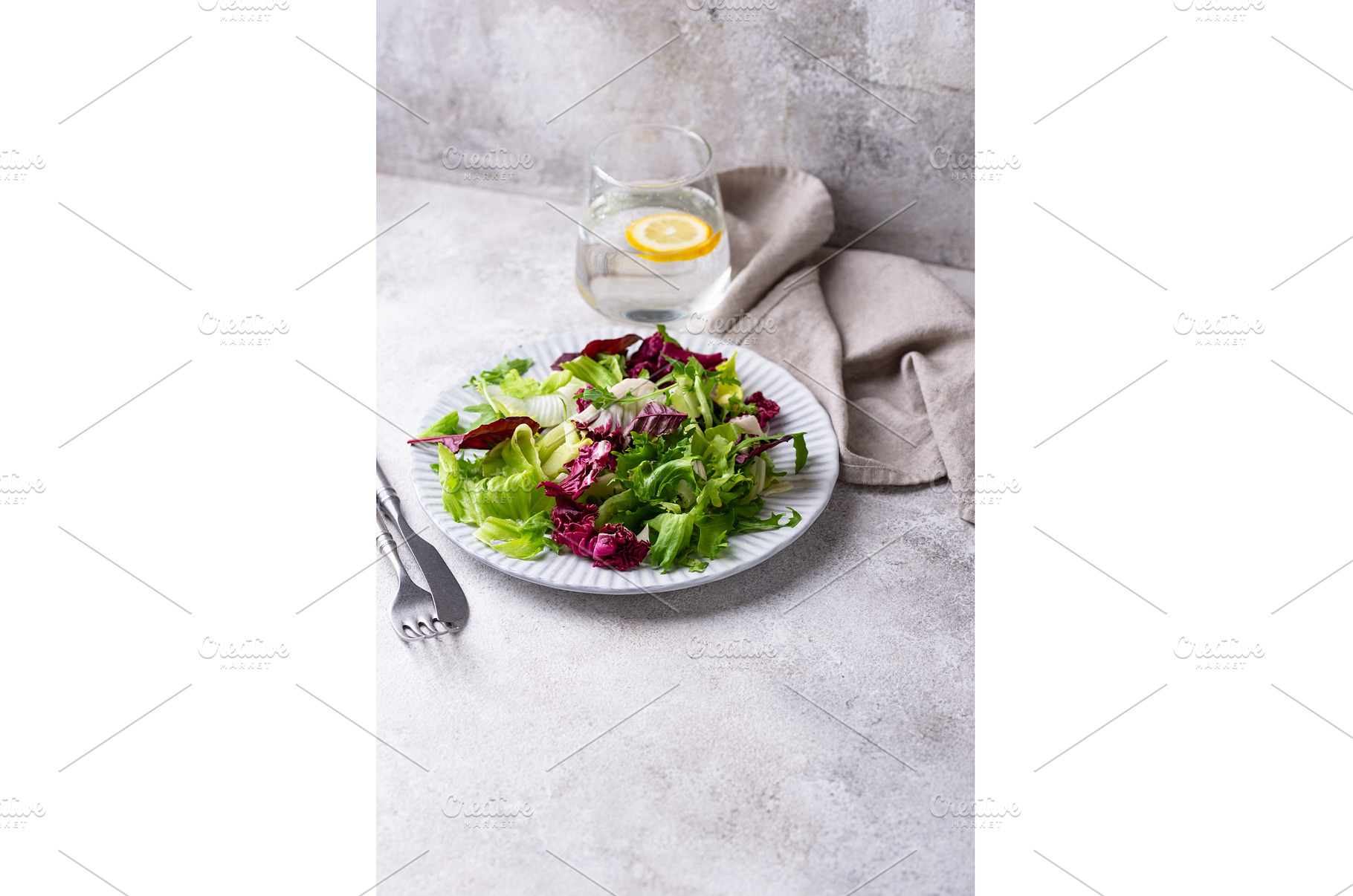 Bowl of fresh green salad mix, a Food & Drink Photo by Yulia Furman