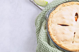 Sweet potato and apple cobbler in glass baking dish, horizontal top view copy s, a Food & Drink Photo by iuliia_n