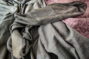Gray boxer shorts camouflaged by sheets of the same color on the, a Beauty & Fashion Photo by DanFLCreativo