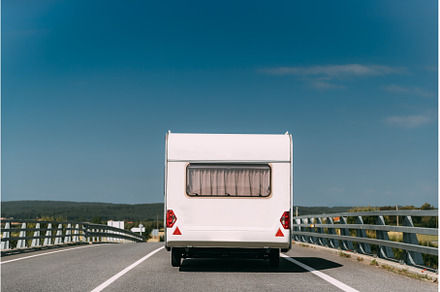 White Colour Motorhome Car Goes On, a Transportation Photo by Our Amazing World