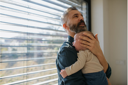 Father comforting his crying baby, a Person Photo by HalfPoint
