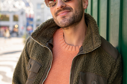 Man wearing sunglasses in city in autumn, a Person Photo by andreonegin market