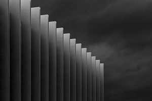 Modern building in black and white containing upv, university, and leioa