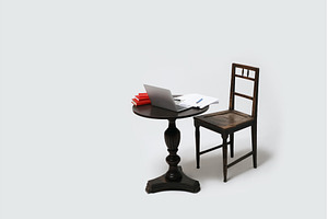 Empty table and chair with laptop, a School & Education Photo by Oleksandr Berezko