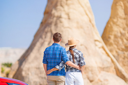 Family on car vacation. Happy couple travel by car in mountains., a Person Photo by travnikovstudio