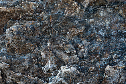 Volcanic rock surface texture, a Background Photo by wr7 Media
