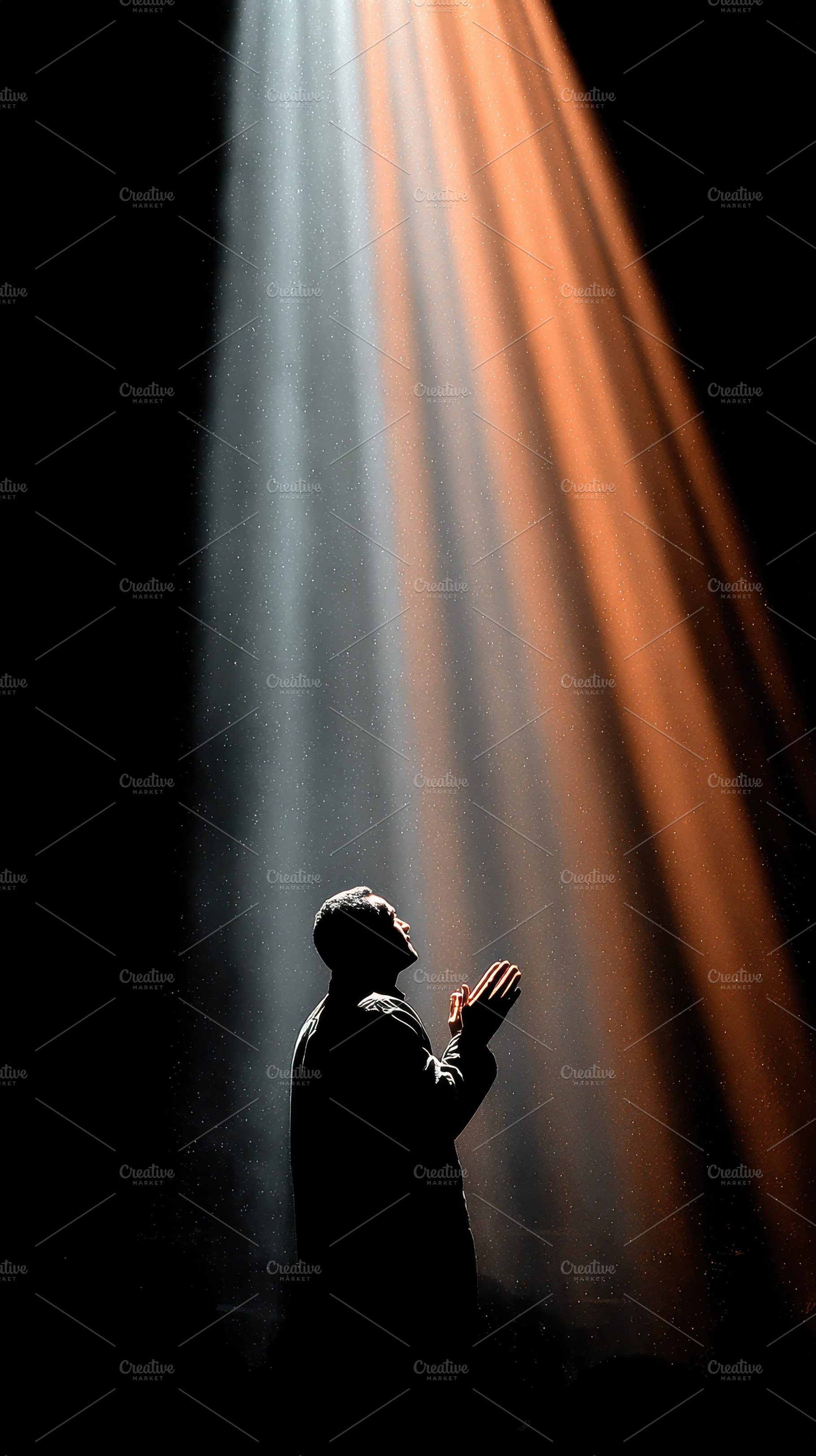 Man Praying in Light Divine Rays Hop, a Photo by Pixeness Studio