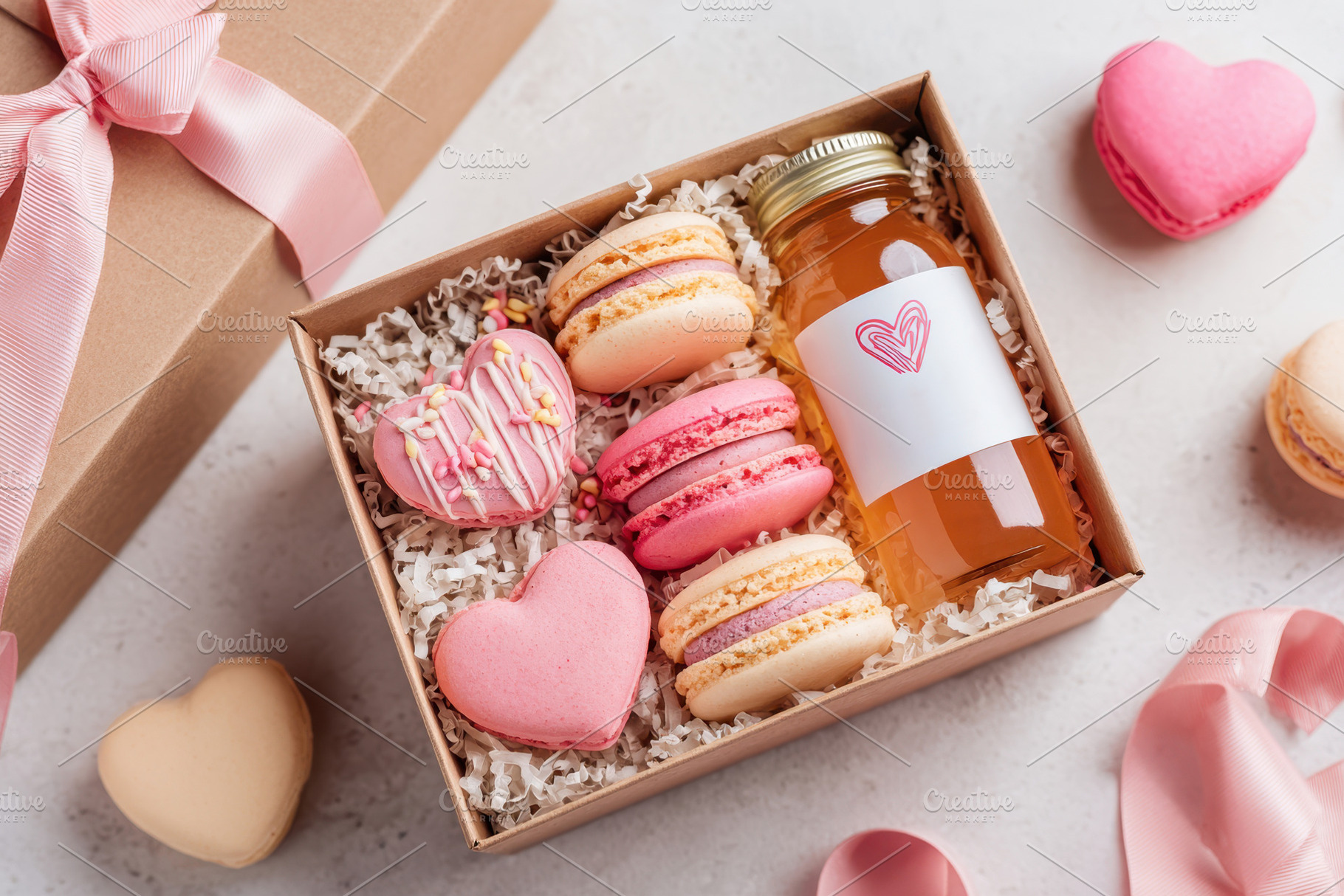 Delightful gift box with macarons and beverage, a Food & Drink Photo by AlyaAnd