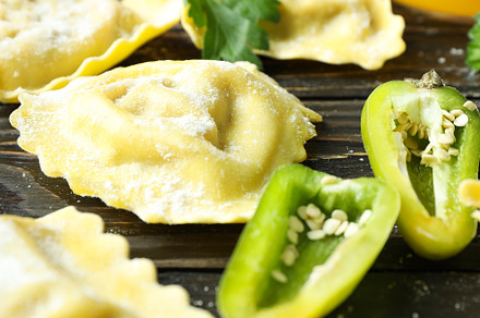 Concept of cooking ravioli on wooden background, a Food & Drink Photo by AtlasStudio PRO
