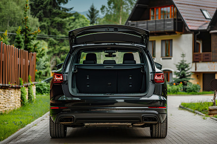 Modern car with open empty trunk, a Transportation Photo by AlyaAnd