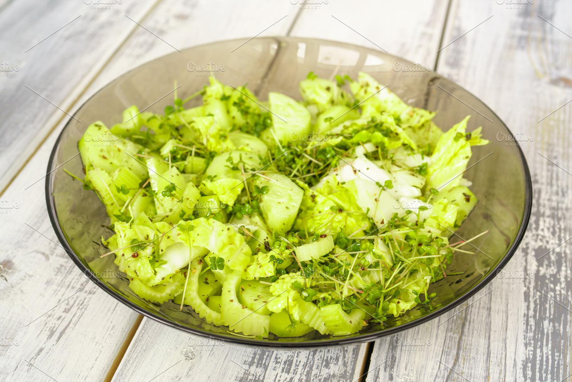 Fresh green microgreen salad on a light blue plate. A natural and organic conce, a Food & Drink Photo by Eugene_Photo