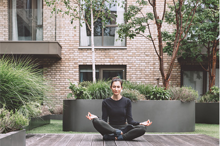 Young woman doing yoga, a School & Education Photo by MAnuta