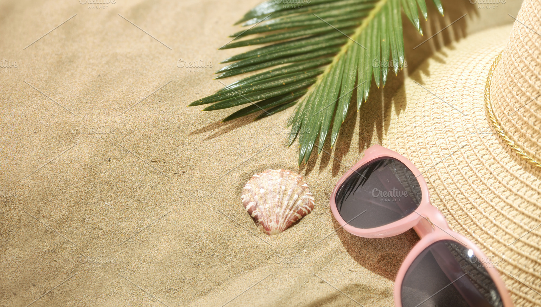 Pink Sunglasses and Straw Hat on Sand, a Holiday Photo by Davizro's Market