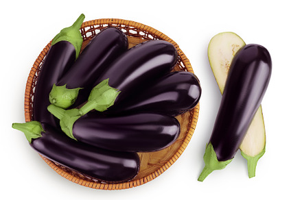 eggplant in a wicker basket isolated, a Food & Drink Photo by NataPhoto