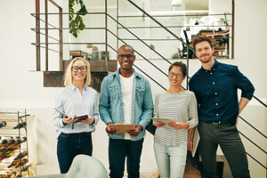 Diverse businesspeople smiling while featuring adults, advertising, and, a Business Photo by Stefan & Janni