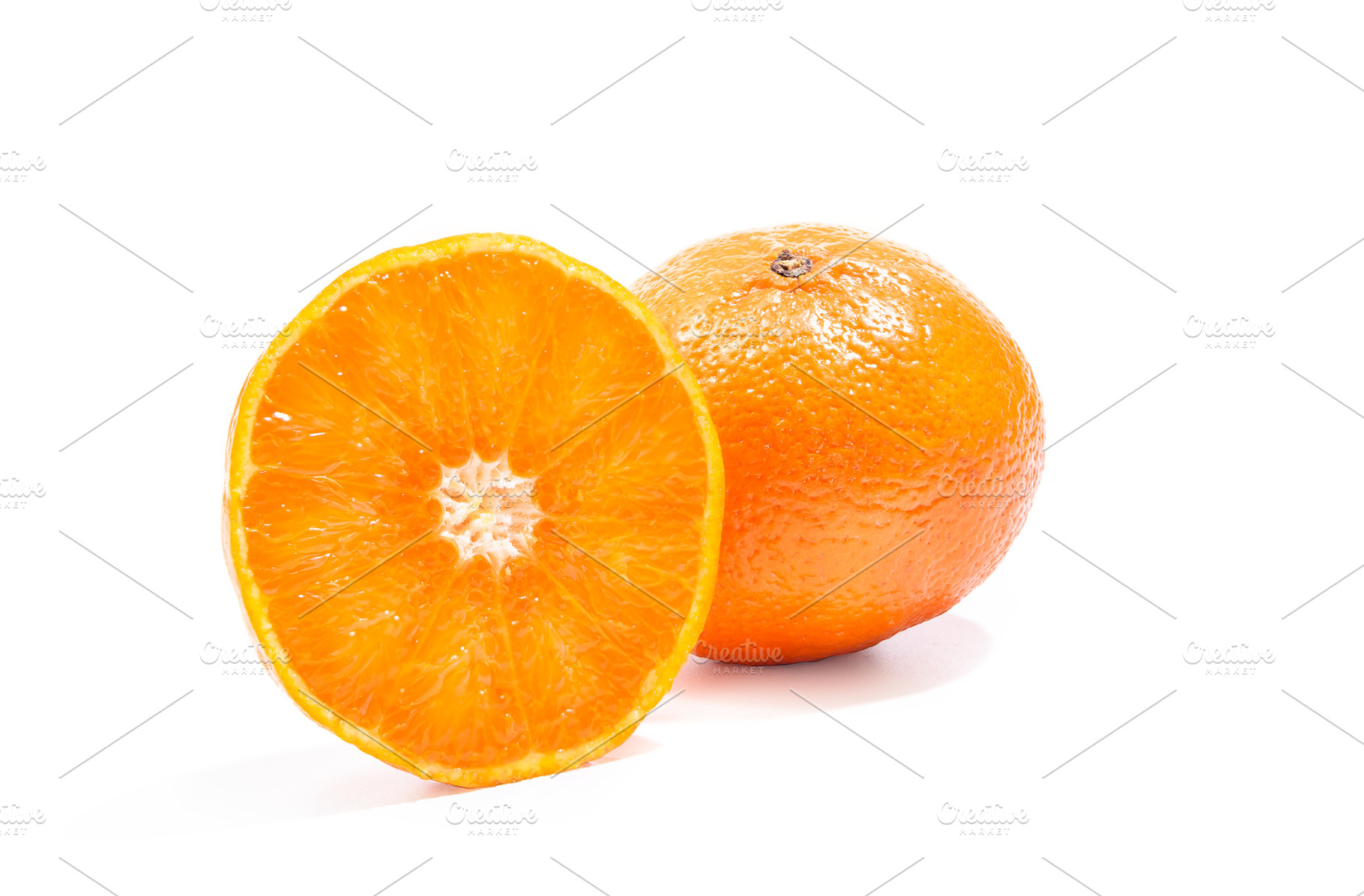 Tangerines on white background, a Photo by wr7 Media