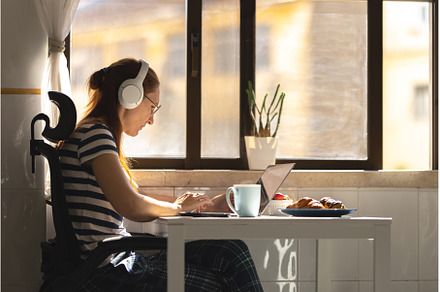Adult woman freelancer in headphones, a Person Photo by Barcelona_dreams