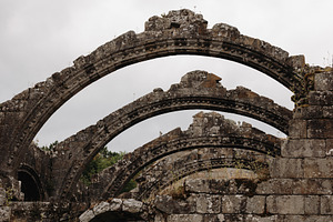 Ruins of medieval stone arches in an, an Architecture Photo by Perpis