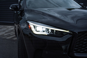 Modern Black Car Headlight Close Up at Night, a Transportation Photo by Red Hot Chili Pepper Shop