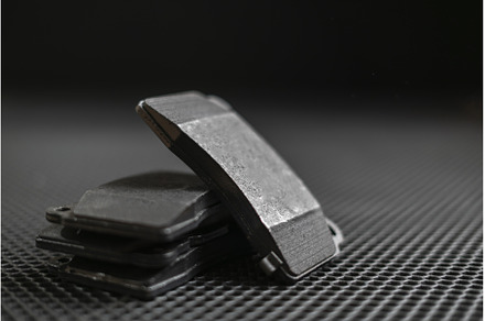 a new sport car brake pads on dark, a Transportation Photo by Mikee's stuff