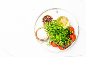 Kitchen table with herbs, spices and, a Food & Drink Photo by Nadia-nb