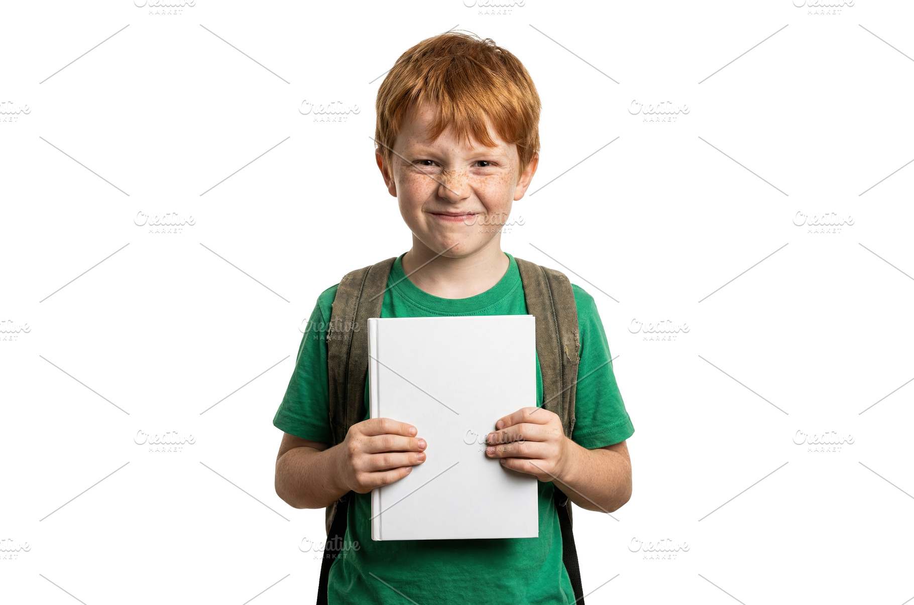 Boy Holding School Book, a School & Education Photo by CREATIVEDEF