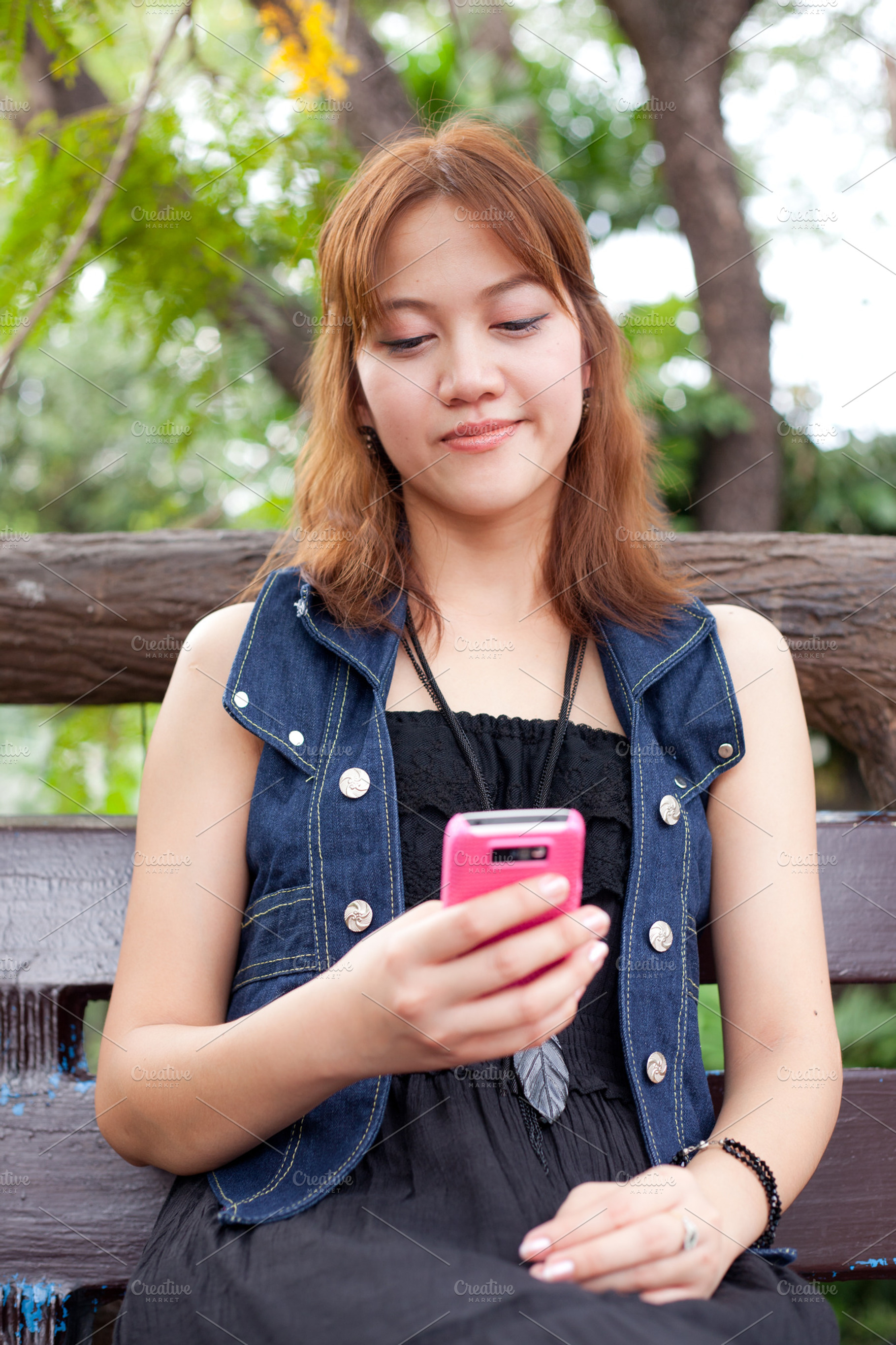 Woman looking for a phone containing adult, asia, and asian, a Person Photo by a454