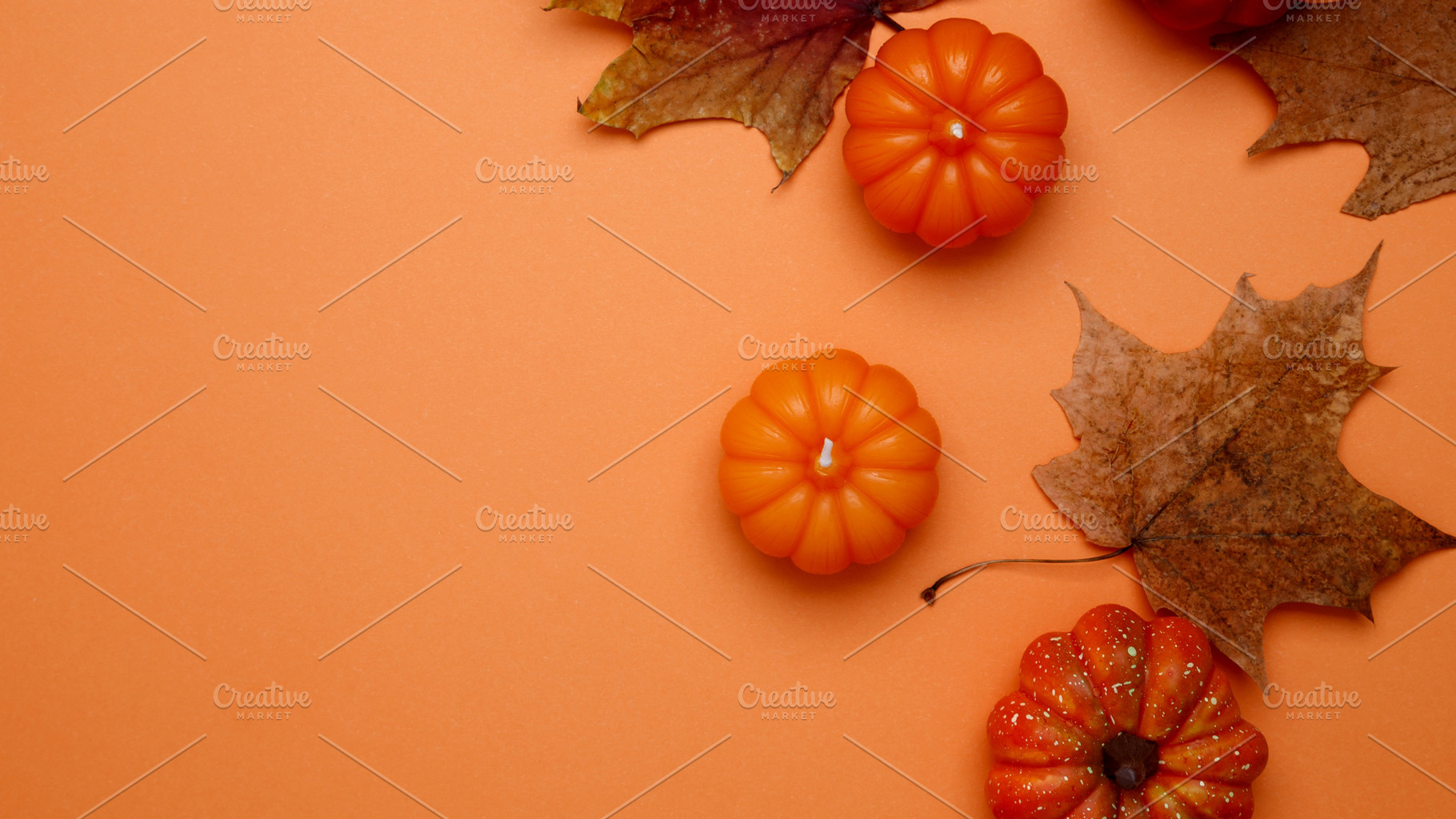 Autumn festive mood. Halloween decoration pumpkins maple leaves, a Photo by matucha