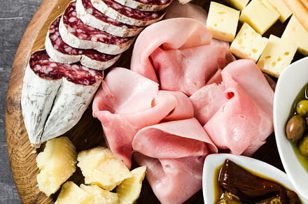 Italian snack and antipasti on a tray and red wine: prosciutto,, a Food & Drink Photo by IriGri