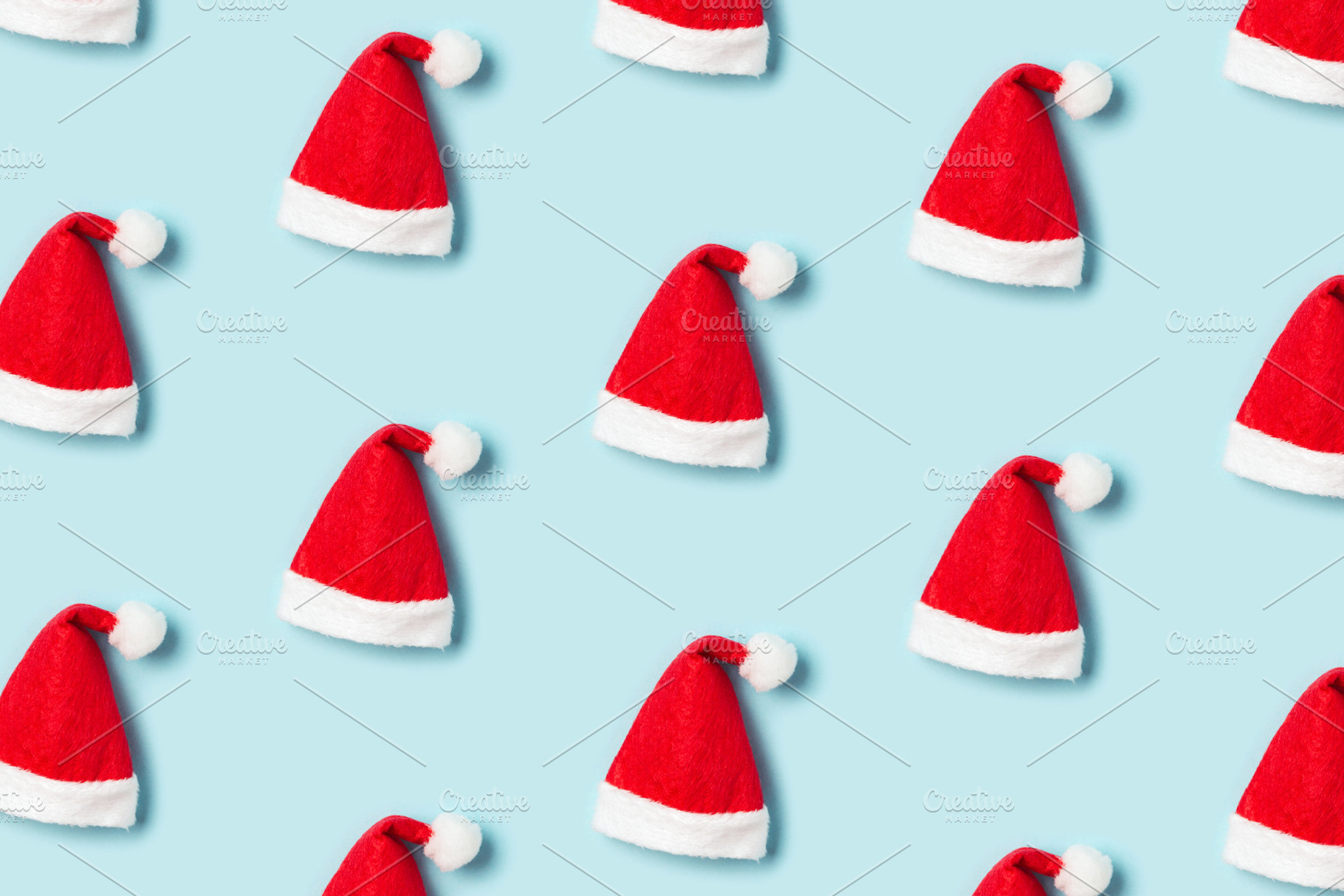 Pattern made of santa claus's hat featuring christmas, santa, and claus, a Holiday Photo by Olga_Z