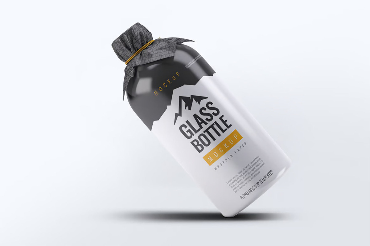 Glass Bottle Wrapped Paper Mock-Up, a Product Mockup by DesignRushMarket (Photo 6 of 7)