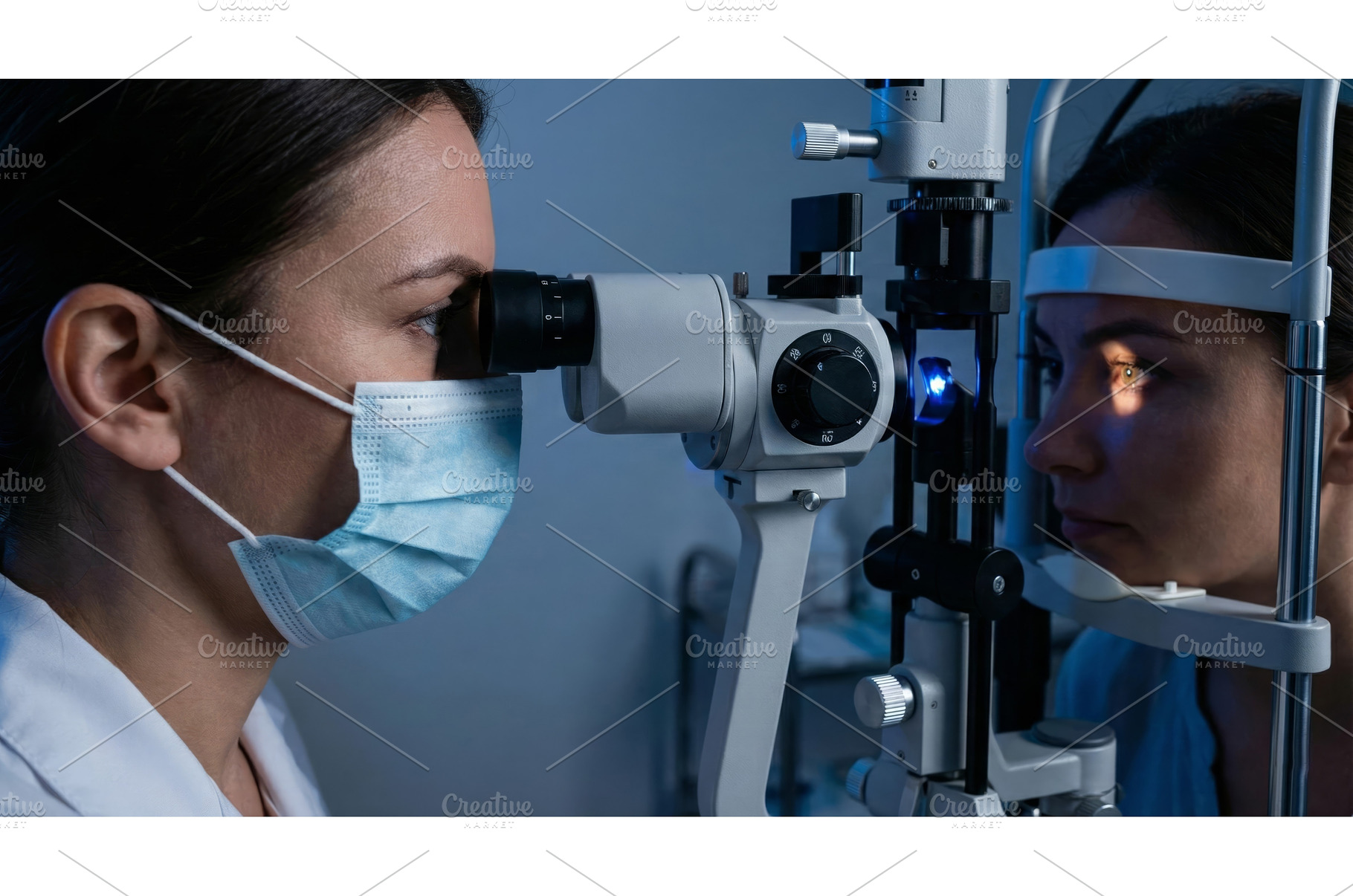 Doc Examines Eyes, a Health & Medical Photo by CREATIVEDEF