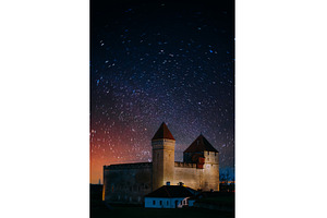 Star trails over the medieval, an Architecture Photo by Our Amazing World